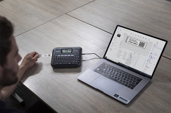 man editing a label on p-touch editor 6 software in the office