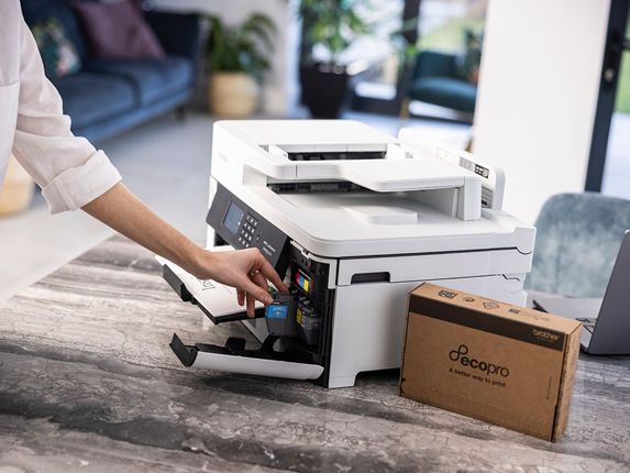 Brother EcoPro printer on green background