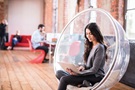 Lady in chair with computer
